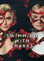 SWIMMING WITH SHARKS