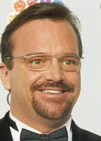 TOM ARNOLD