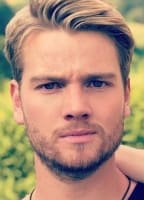 AARON KOSZUTA
